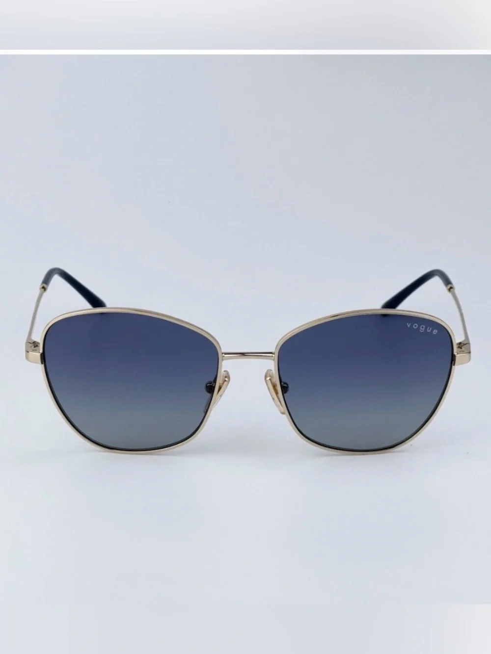 Vogue Women's Gold Frame Sunglasses with Blue Gradient Lenses